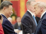 DONALD Trump y Xi Jinping, en el banquete de Estado en el Gran Salón del Pueblo en Pekín, ayer.