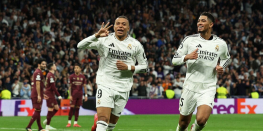 Mbappé y Bellingham celebran el tercer gol del Real Madrid en el Bernabéu.
