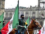 Durante el desfile militar del 210 de aniversario de la Independencia de México.