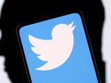 Twitter logo and Elon Musk silhouette are seen in this illustration taken, December 19, 2022. REUTERS/Dado Ruvic/Illustration/File Photo