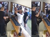Aficionado inglés lanza cerveza a la cara de su amigo.