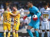 López y Gignac celebran el primer gol de Tigres, ayer en Ciudad Universitaria.