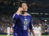 Daichi Kamada festeja el primer gol del juego 1000 de los Mundiales en el Túnez vs Japón.
