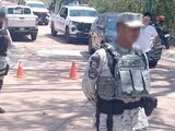 Elementos de la Guardia Nacional, en las instalaciones del campo de golf de Huatulco, el jueves.