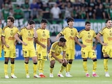 FUTBOLISTAS del América se lamentan después de caer en la tanda desde los 11 pasos, ayer, en Estados Unidos.