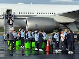 Los jugadores llegando a Cancún.
