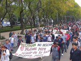 Normalistas y padres de los 43 marcharon por 100 meses de la desaparición, en Paseo de la Reforma, ayer.
