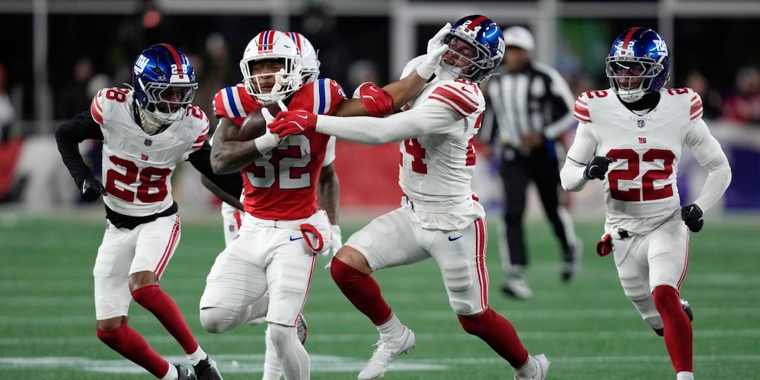 Los New England Patriots en el juego ante los New York Giants en la NFL