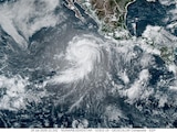 Huracán "Genevieve", de categoría 4, visto desde un satélite de la NOAA, el 26 de julio de 2026.