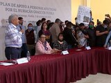 Manifestantes irrumpen evento de AMLO en Puebla