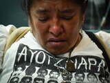 Familiares de los estudiantes normalistas desaparecidos de Ayotzinapa, durante el último informe del grupo Interdisciplinario de Expertos Independientes obre el caso de la desaparición forzada del caso Ayotzinapa.