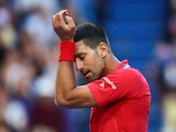 Djokovic se lamenta, tras quedar fuera del certamen, ayer.