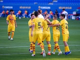 Jugadores del conjunto culé festejan una anotación contra el Gimnástic de Tarragona.
