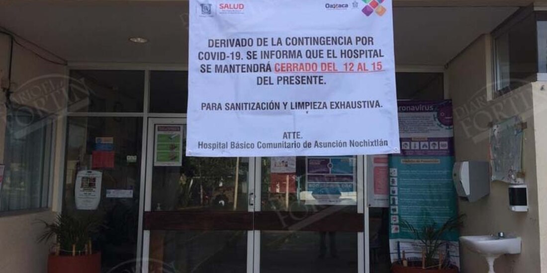 Personal del Salud coloca anuncio sobre el cierre que se extiende hasta el próximo 14 de julio.