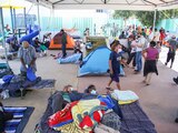 Migrantes descansan, ayer, en la Casa del Peregrino, tras llegar a la CDMX.