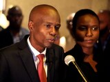 FILE PHOTO: Jovenel Moise addresses the media next to his wife Martine after winning the 2016 presidential election, in Port-au-Prince, Haiti. Picture taken November 28, 2016. REUTERS/Jeanty Junior Augustin/File Photo