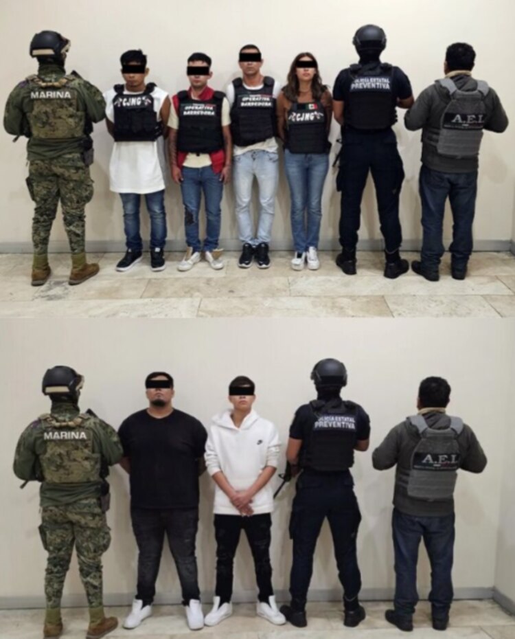 Presuntos integrantes de La Barredora custodiados, ayer, por la SSPC y Semar.