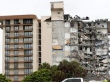 Se derrumba edificio de Miami; elevan a 99 desaparecidos
