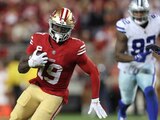 El receptor abierto de los 49ers de San Francisco, Deebo Samuel (19), corre contra los Cowboys de Dallas en la NFL