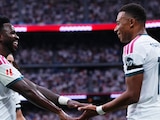 Vinícius Jr. y Kylian Mbappé celebrando el gol del francés.