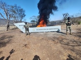 Una fotografía ilustrativa sobre destrucción de enervantes encabezada por la Marina.