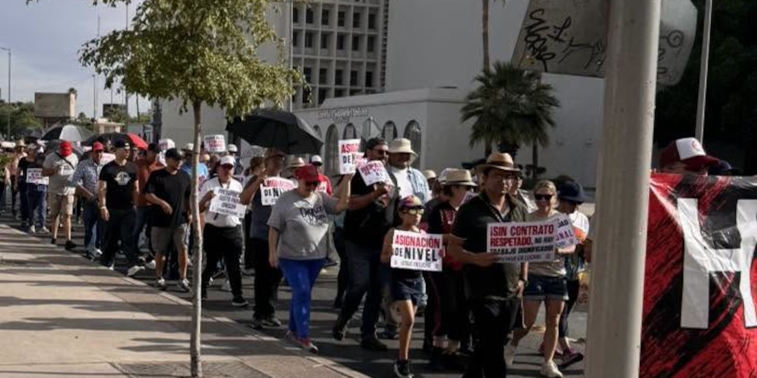 Trabajadores marchan para apoyar a compañeros de la UNISON que se encuentran en huelga.