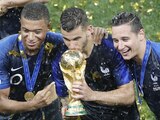 Thauvin, nuevo refuerzo de Tigres, celebrando junto con Mbappé y Lucas Hernández, el título del Mundial 2018