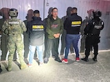 Misael Fragoso Báez, custodiado por elementos de la Marina, la FGJ del Edomex y del GOES, ayer.