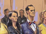 El expresidente venezolano, Nicolás Maduro, y Cilia Flores, de amarillo, en una audiencia en EU, ayer.