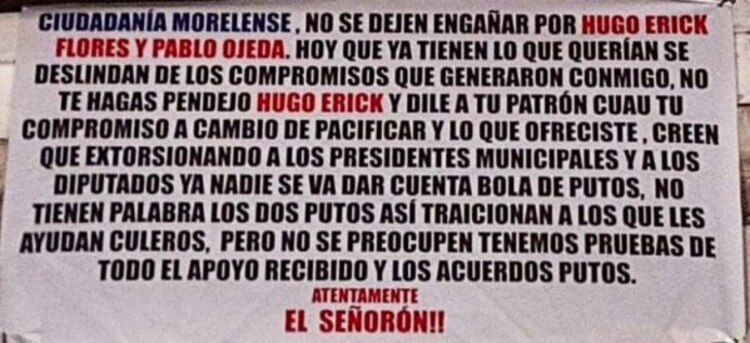 Narcomanta colgada en el puente Tabachínes