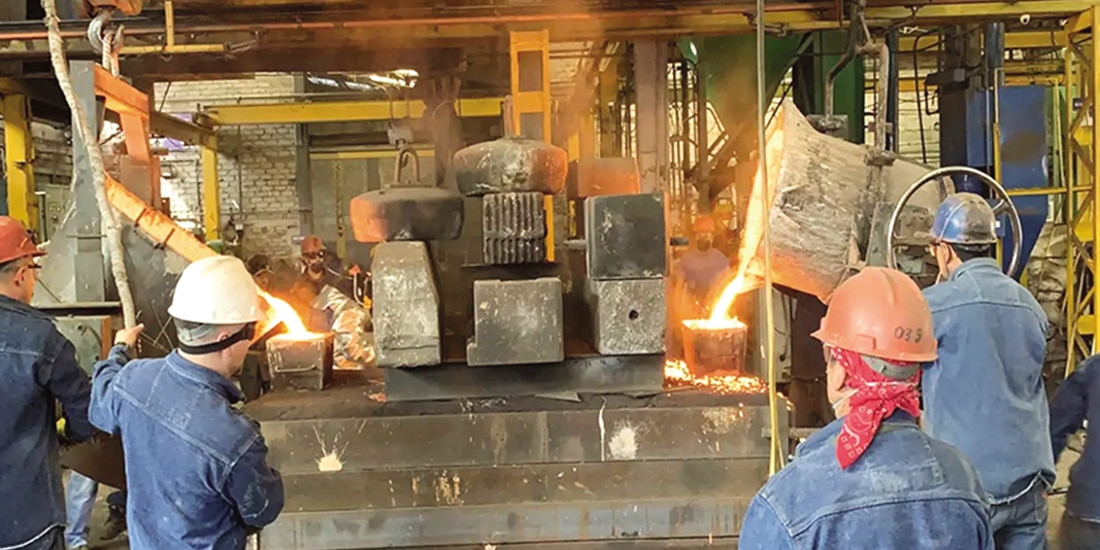 Trabajadores de la industria
en una imagen
de archivo.