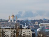 Smoke from fire rises above the city in the course of Russia-Ukraine conflict in Donetsk, Russian-controlled Ukraine, January 22, 2024. REUTERS/Alexander Ermochenko