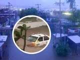 Corriente de agua arrastró un taxi en Acapulco.
