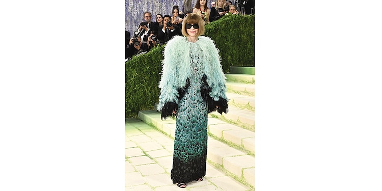 ANNA WINTOUR apostó por
un Chanel.