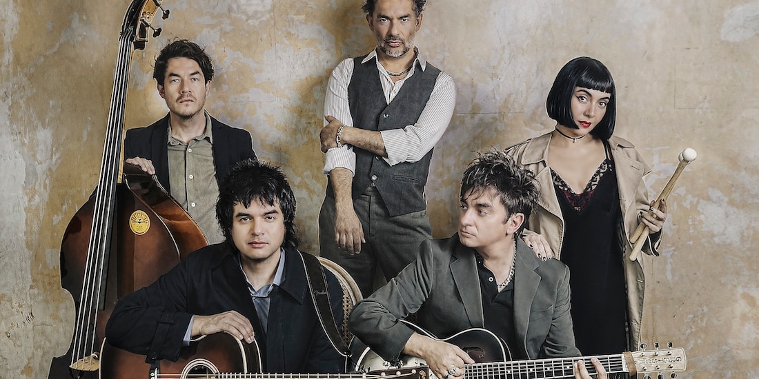 Los integrantes de la banda, en una sesión fotográfica.