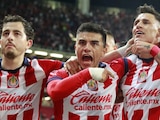 Jugadores de Chivas celebran un gol en el Torneo Apertura 2023 de la Liga MX.