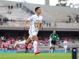 Juan Ignacio Dinenno celebra un gol en el Pumas vs Xolos de la Liga MX