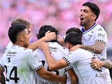Jugadores de Querétaro celebran su primera anotación en el Estadio AKRON.