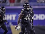 Jugadores de los Ravens celebran una acción del duelo ante Cowboys de la Semana 13 de la NFL.