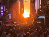 "Manhattanhenge", puesta de sol en medio de edificios, reúne dos veces al año a miles de neoyorquinos.