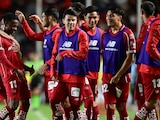 Helinho celebrando su anotación ante Querétaro con sus compañeros.