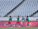 Jugadores de México celebran una anotación en los Juegos Olímpicos