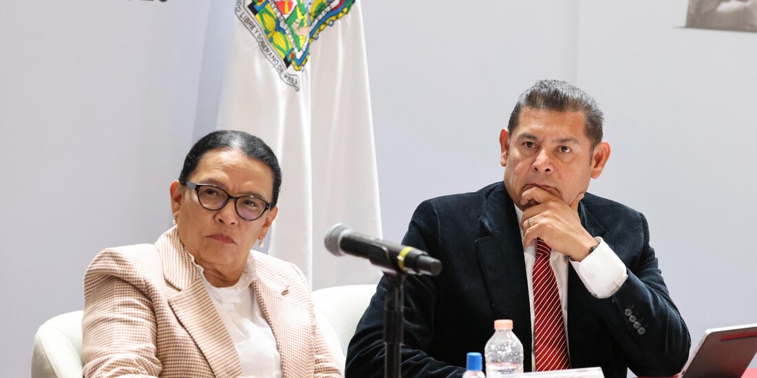 La titular de Segob y el Gobernador de Puebla.