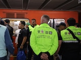 En la imagen, personal del Metro.