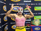 Olympia junto al Campeonato Universal de Amazonas del CMLL