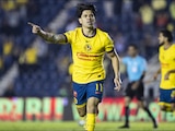 Víctor Dávila festeja un gol con el América en la Liga MX.