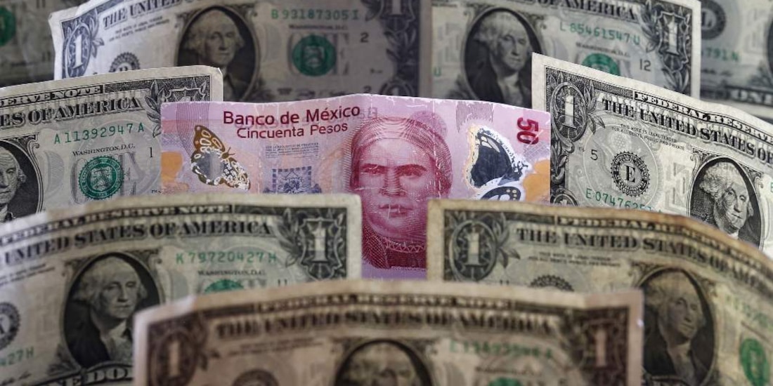 El tipo de cambio interbancario cotizaba en 21.5180 por dólar.