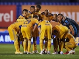 Futbolistas de Tigres previo al arranque de un partido en el Torneo Guard1anes 2021.