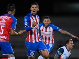 Ángel Zaldívar festeja el tercer tanto de los rojiblancos en Ciudad Universitaria.