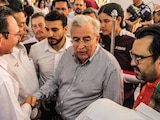 El gobernador Rocha y el exdirector del deporte de Guasave (izq.), en imagen de archivo.